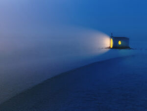Chapel with light shining from it