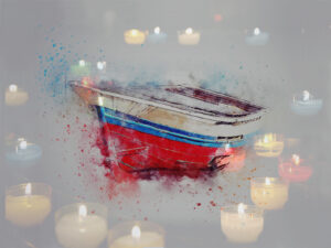 A boat surrounded by candles